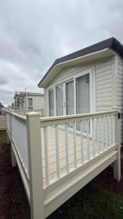Homely 8 berth caravan with front decking at New Beach in Kent ref 66654NB - 8