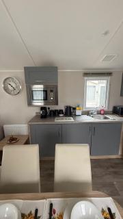 Homely 8 berth caravan with front decking at New Beach in Kent ref 66654NB - 4