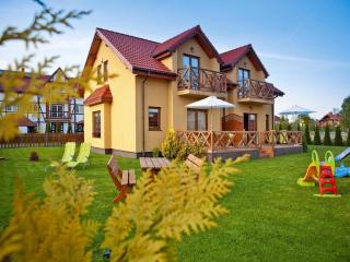 Half of holiday home, terrace, playground - 0