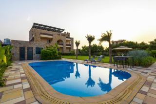 ELIVAAS Prive Chez Nandani 5 BHK Mediterranean-Style Farm House With Private Outdoor Heated Pool , Theater , Bar And Garden Area - 9