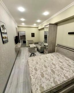 Cozy Center Apartment with City View & Balcony - 0