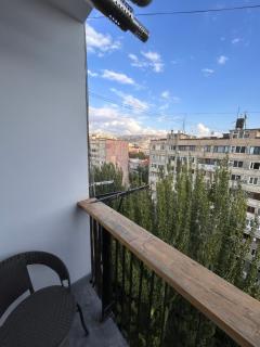 Cozy Center Apartment with City View & Balcony - 1