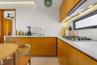 New Listing 2BR condo near the ocean with pool, gym, WiFi, and parking - 1