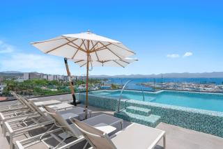 2BR condo near the ocean with pool, gym, WiFi & balcony - 1