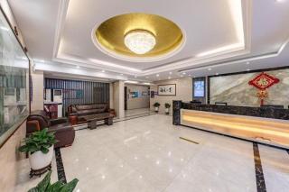 Zhenxing Hotel - 8