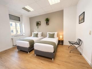 6-Personen Apartment ideal für Monteure, Berufstätige, langfristige Aufenthalte - Einzelbetten, Self Check-in, Küche, Waschmaschine - 3