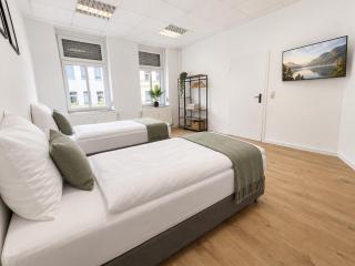 6-Personen Apartment ideal für Monteure, Berufstätige, langfristige Aufenthalte - Einzelbetten, Self Check-in, Küche, Waschmaschine - 1