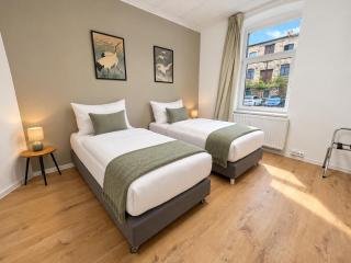 6-Personen Apartment ideal für Monteure, Berufstätige, langfristige Aufenthalte - Einzelbetten, Self Check-in, Küche, Waschmaschine - 6