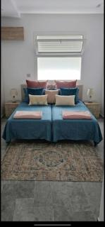 A one-bedroom apartment with a living room, kitchen, and balcony - 5
