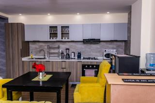 serene stays apartment with fully equipped gym , heated swimming pool ,private parking space and amazing scenic views - 3