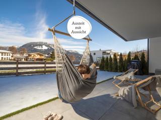 Fewo Tirolglück - Perfekt für Paare, Freunde, Kinder & Hunde - 2 SZ, 2 BZ - Garten, Bergblick & Ruhe - Umgebung schneesicher bis April, Skibus St Johann - 2 Min zu Fuß ins Zentrum - 0