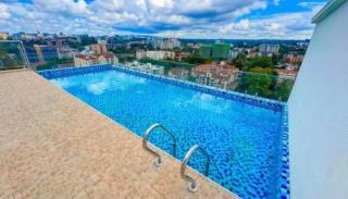 Cozy 1BR in Westlands with a Pool, Gym, Rooftop & Downstairs Restaurants - 9