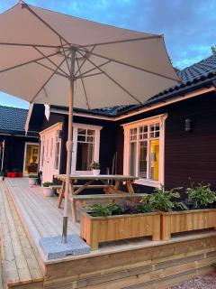 Charming log house with river views near Femtfallet in Ambjörby - 0