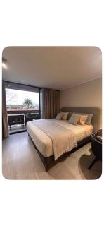 Departamento a pasos del Movistar con cama king - 0
