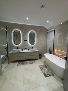 Tricabel Villa 3 Modern 4-Bedroom Luxury Retreat in Ezulwini - 7
