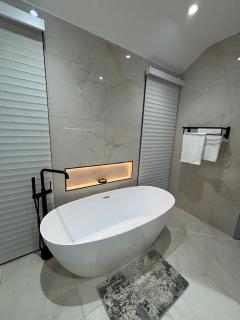 Tricabel Villa 3 Modern 4-Bedroom Luxury Retreat in Ezulwini - 4