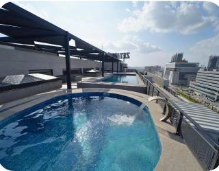 Cozy 1BR Apartment with Infinity Pool Zeta Mall DHA Phase 2 Islamabad - 7