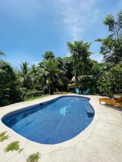 Pangea Lodge Tropical Vibe Home with Shared Pool - 1