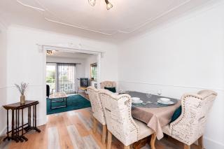 Chic 3BR Home with Balcony & Free Parking - 7