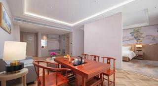 Vienna Hotel Lincang New Asia Pacific Times Square - 9