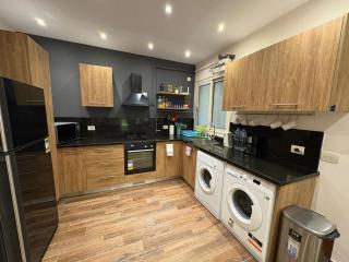 Top-rated 1BR with Private Garden in Compound - only families & single travelers - 7