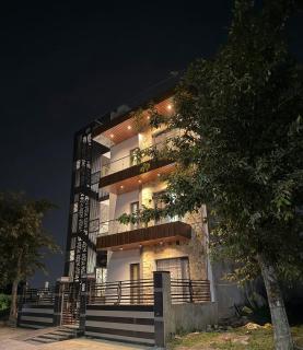 Cozy 3BHK rooftop terrace getaway with a projector - 3