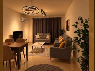 Modern 2BR in Madinaty | Cozy & Fully Equipped - 0