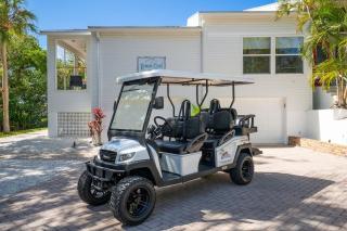 Golf Cart included! Waterfront home with Private Boat Dock Heated Pool and Game Room - 9