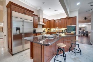 Golf Cart included! Waterfront home with Private Boat Dock Heated Pool and Game Room - 6