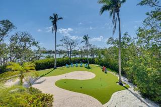 Golf Cart included! Waterfront home with Private Boat Dock Heated Pool and Game Room - 5