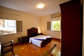 Warm Wooden Bedroom - 1