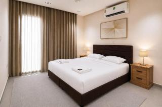 Modern 2-Bedroom Apartment with Private Terrace & Free Parking - Aqaba - 9
