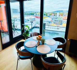 Premium Waterfront 2BR Apt with Balcony and Parking - 6
