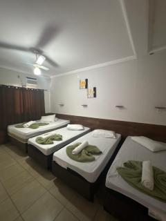 Pousada Quarto Suíte Famíliar com ar,frigobar, wi fi e garagem - 8