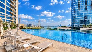 Vogue Vacation Homes, Marina 52-42 Towers near Ain Dubai and JBR Beach, Two Bedroom Apartment with Balcony Canal and Skyline views, Access to all Amenities - 0