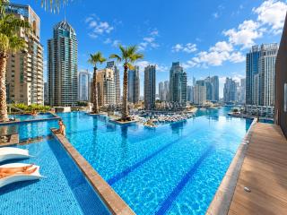 Vogue Vacation Homes, Marina Gate near JBR Beach and Marina Mall, One Bedroom Apartment with Balcony and city skyline view, Access to all Amenities - 0
