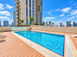 Vogue Vacation Homes, JVC Jeewar Tower near Circle Mall, Two Bedroom Apartment with Balcony and City View, Access to all Amenities - Dubai - 0