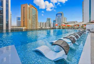 Vogue Vacation Homes, Downtown Mag 318 near Burj Khalifa and Dubai Mall, Studio Apartment with Balcony and City View, Access to all Amenities - 0