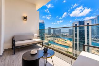 Vogue Vacation Homes, Downtown Mag 318 near Burj Khalifa and Dubai Mall, Studio Apartment with Balcony, Canal and City View, Access to all Amenities - 8