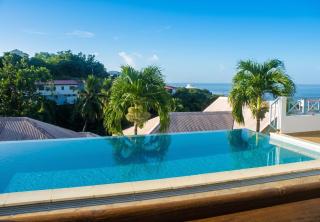 Appartement Le Carbet 65 m² - Vue mer, chaise haute - 0