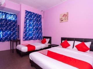 OYO 1125 IR Inn Hotel - 1