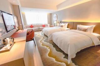 Echeng Hotel Laibing Jinxiu Shuidian Tower - 9