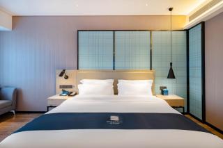 Echarm Hotel Suzhou Shengze Oriental Extile City - 8