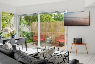 Coastal 2BR Duplex Garden Retreat - 4
