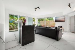 Coastal 2BR Duplex Garden Retreat - 6