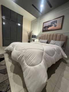 1BHK APARTMENT IN ABUDABI TOWER F-11 NEAR MARKAZ The Heart of ISLAMABAD - 5
