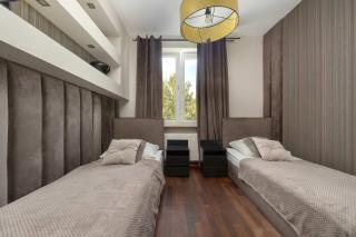 Funkcjonalny Apartamet z Klimtyzacją i Sauną w Kielcach by Noclegi Renters - 9