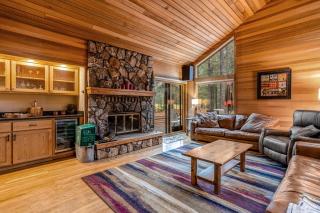 Forested getaway with kitchen stone fireplace pool & private hot tub - 0
