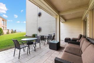 First Floor Beachfront Gem with Resort Amenities - 7