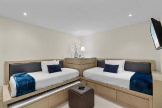 First Floor Beachfront Gem with Resort Amenities - 1